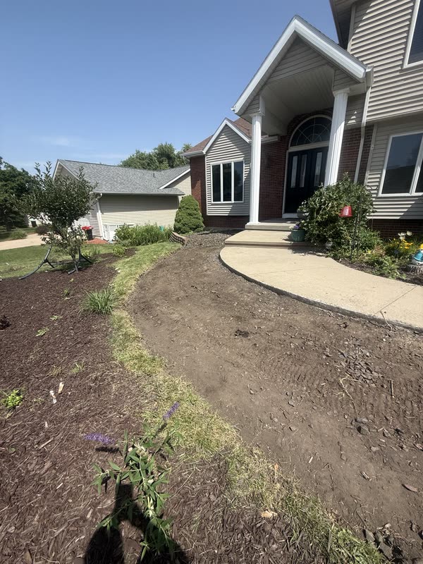 Residential front regraded around a curving sidewalk